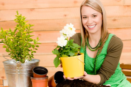 Supervisor assessing a gardening service complaint
